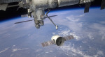 Malířova představa příletu Dragonu k ISS. Foto: SpaceX