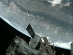 Loď Dragon připojená k ISS. Foto: NASA TV