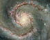 M51: Vírová galaxie v prachu a hvězdách