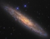 NGC 253: Prašný vesmírný ostrov