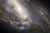 Neobvyklá spirální galaxie M66 z Hubbla