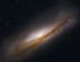 Spirální galaxie NGC 3190 téměř z boku