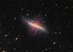 M82: Galaxie s překotnou tvorbou hvězd a supervětrem