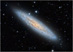 NGC 253: Galaxie v Sochaři