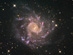 Velká spirální galaxie NGC 7424