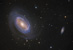 Jednoramenná spirální galaxie NGC 4725