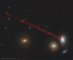 Dlouhý plynový ohon spirální galaxie D100